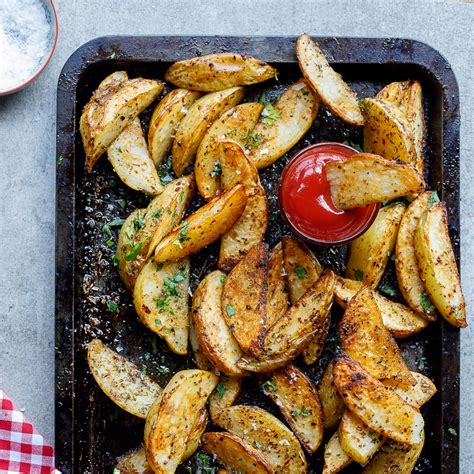 easy-spicy-garlic-baked-potato-wedges-simply-delicious image