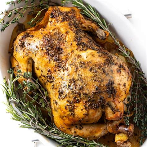 crock-pot-whole-chicken-recipe-with-garlic-herb-butter image
