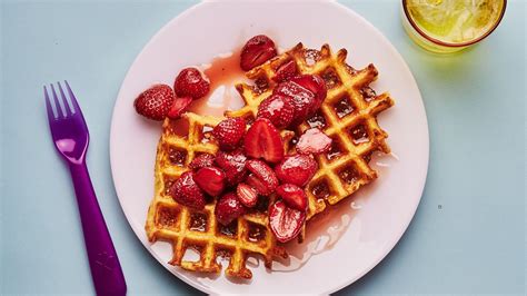 corn-waffles-with-strawberry-syrup-recipe-bon-apptit image