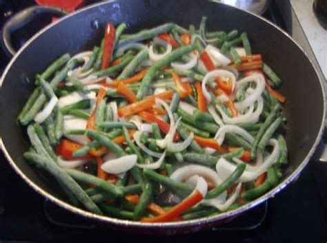 sauteed-green-beans-red-peppers-and-onions image