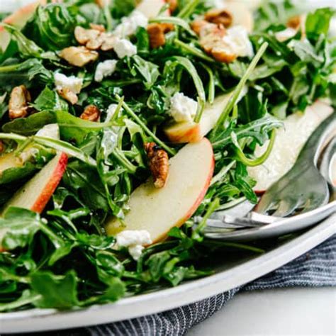 arugula-apple-salad-with-pecans-and-goat-cheese-pinch image