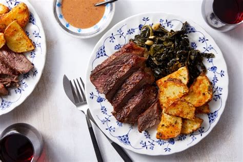 strip-steak-potatoes-with-spicy-maple-collard-greens image