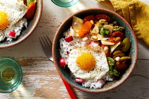 sweet-sour-vegetable-stir-fry-with-fried-eggs-peanuts image