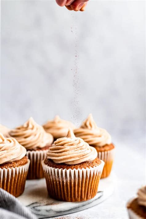 pumpkin-cupcakes-with-cinnamon-cream-cheese-frosting image