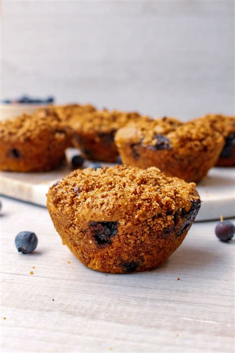 peanut-butter-and-blueberry-muffins-nourishing-amy image