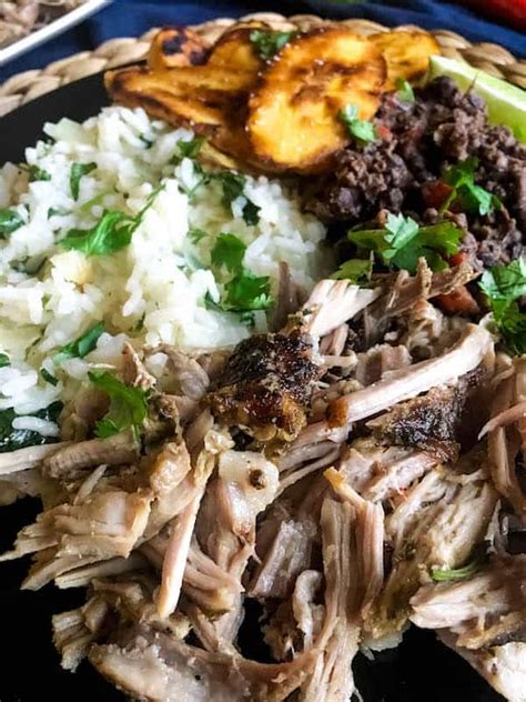 cuban-pork-rice-bowls-with-black-beans-and-plantains image