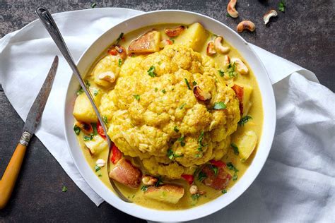 slow-cooker-whole-cauliflower-curry-and-cashew image