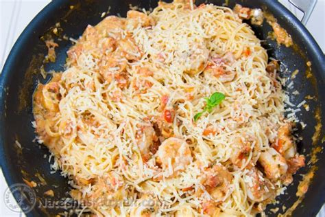 spaghetti-with-shrimp-in-a-creamy-tomato-sauce image