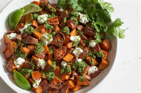 oven-roasted-sweet-potatoes-with-chile-lime-cilantro image