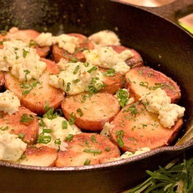 simple-skillet-potatoes-with-garlic-and-herb-cheese image