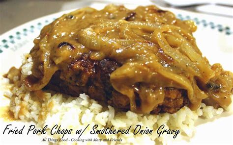 fried-pork-chops-with-smothered-onion-gravy image