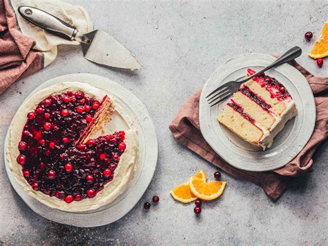 white-cake-with-cranberry-filling-and-orange-buttercream image