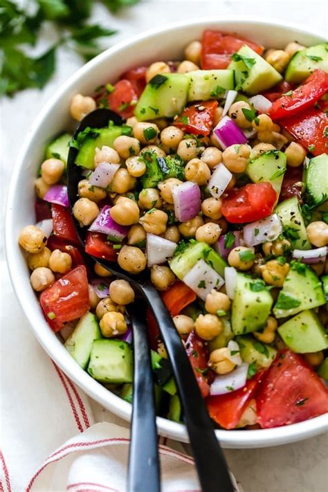 chickpea-salad-with-cucumbers-and-tomatoes image