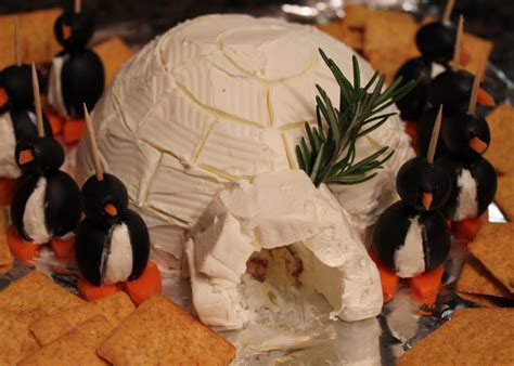 how-to-make-a-cheese-ball-igloo-with-olive-penguins image