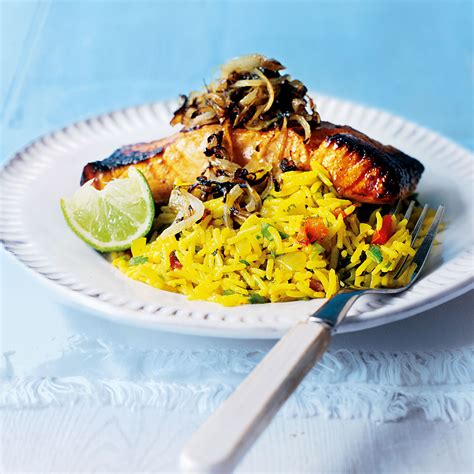 grilled-tikka-salmon-with-spicy-rice-pilaf-woman image