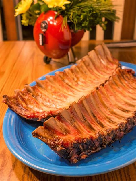 gas-grilled-baby-back-ribs-with-garlic-sage-rosemary image