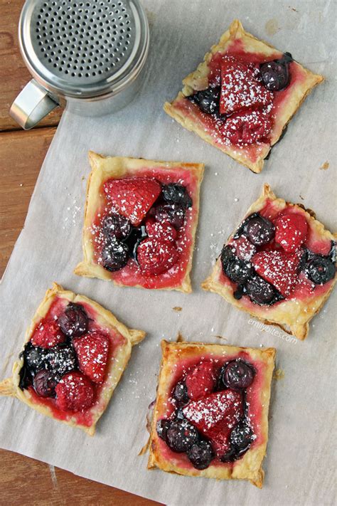 mixed-berry-puff-pastry-tarts-emily-bites image