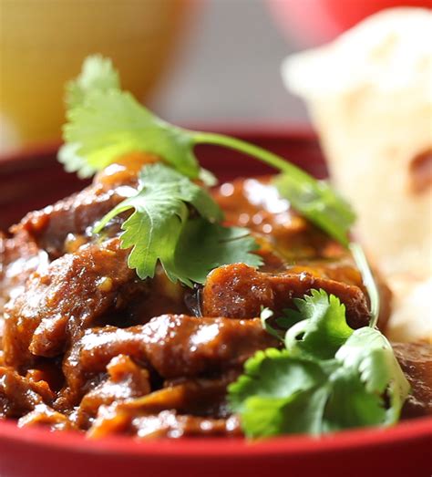 cape-malay-beef-curry-with-roti-le-creuset image
