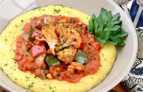 cajun-roasted-vegetables-with-cheesy-grits-vintage image
