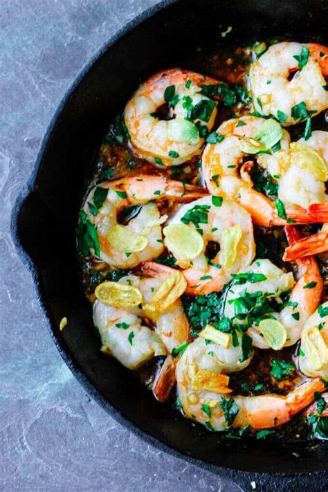 spanish-style-garlic-shrimp-gambas-al-ajillo-eating image