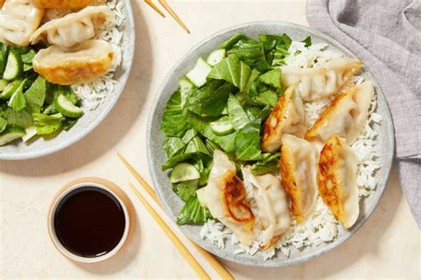 seared-beef-dumplings-jasmine-rice-with-sesame image