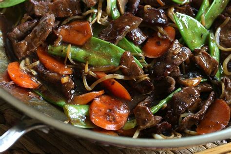 beef-stir-fry-with-snow-peas-and-mushrooms-the-daring image