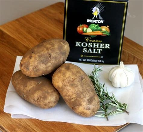 salt-baked-potatoes-with-roasted-garlic-rosemary image