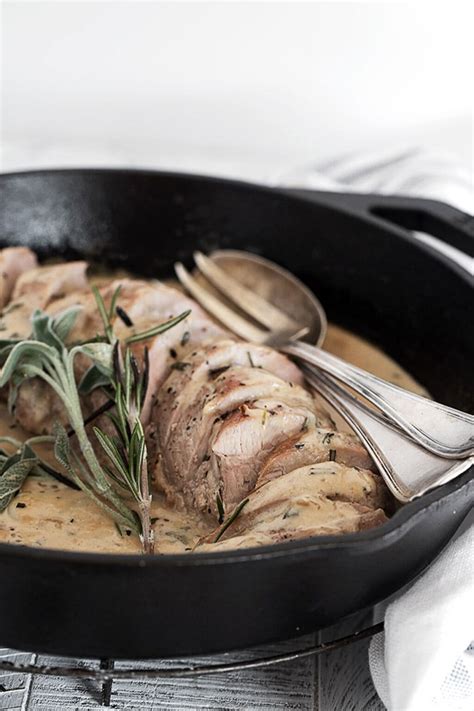 pork-tenderloin-with-creamy-herb-and-garlic-sauce image