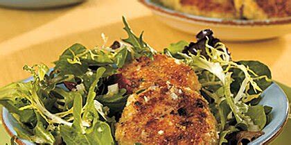 crab-cakes-over-mixed-greens-with-lemon-dressing image