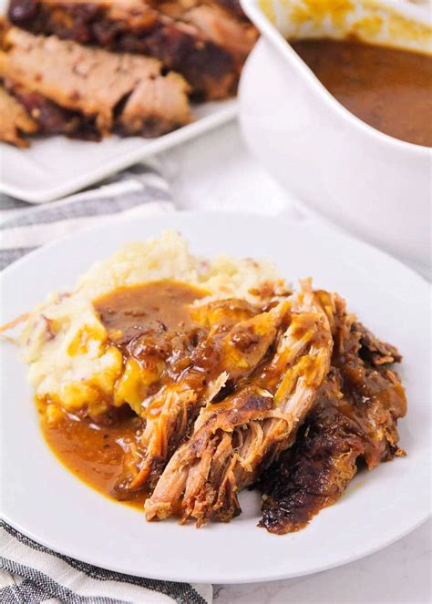 crock-pot-pork-roast-recipe-with-gravy-lil-luna image