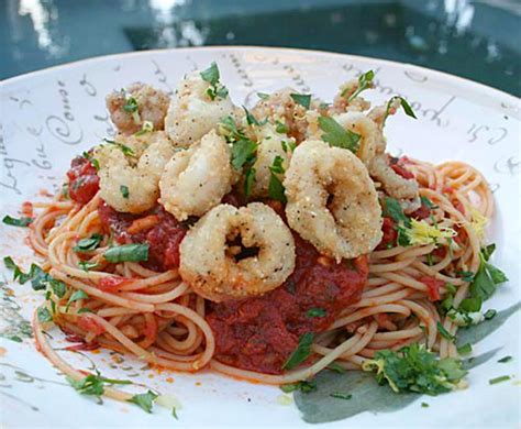 spaghetti-with-spicy-tomato-sauce-and-fried-calamari image
