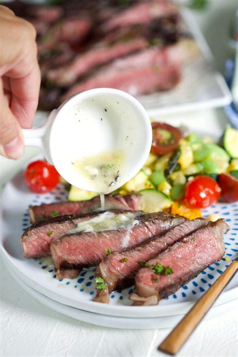 grilled-ribeye-steak-with-garlic-butter-sauce image