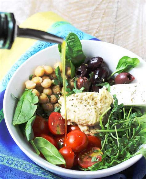 mediterranean-hummus-bowl-with-chickpeas-olives image