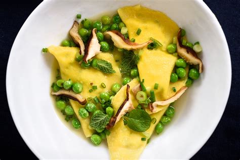 mezzelune-pasta-with-peas-and-shiitake-mushrooms image
