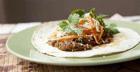 slow-cooker-korean-beef-tacos-with-crunchy-slaw image