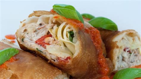 crab-and-artichoke-strudel-with-roasted-red-pepper-sauce image