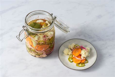 spicy-pickled-cauliflower-carrots-and-jalapenos image