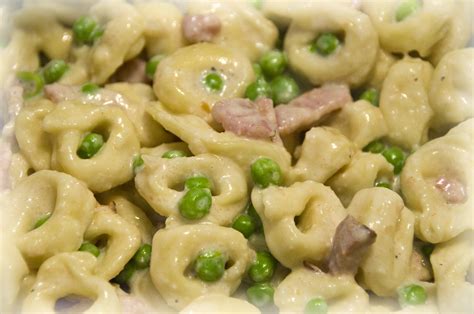 baked-tortellini-with-peas-and-ham-in-cream-sauce image