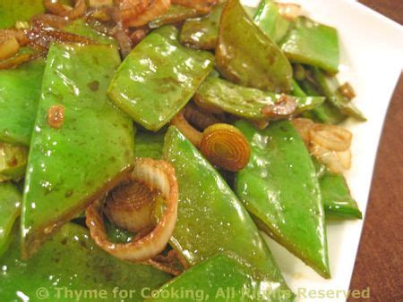 sauted-snow-peas-mangetout-with-green-garlic image
