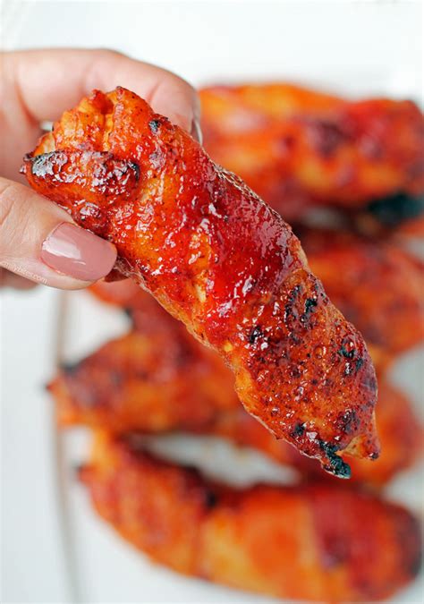 barbecue-bacon-wrapped-chicken-tenders-emily-bites image