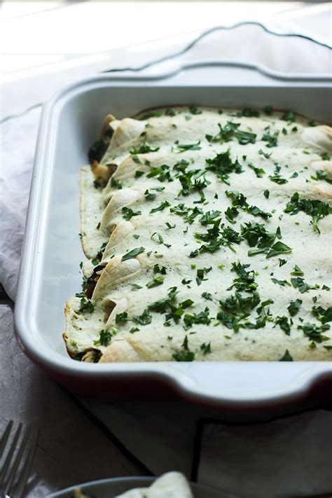spinach-chicken-and-cheese-enchiladas-with-jalapeo-cream image
