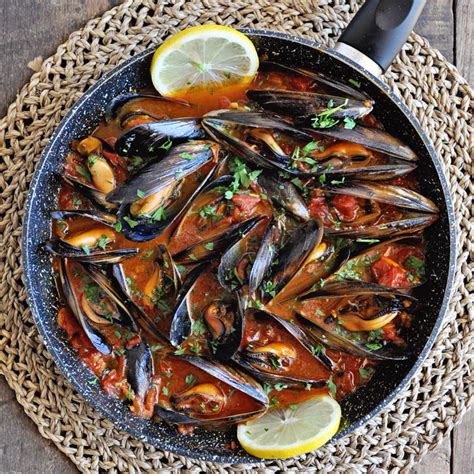 spanish-mussels-recipe-with-paprika-tomatoes-spain image