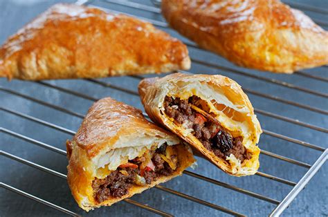 curried-lamb-hand-pies-andrew-zimmern image