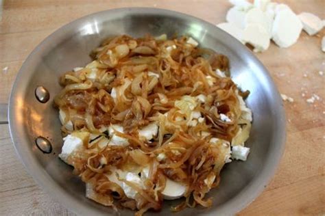baked-goat-cheese-with-caramelized-onions-delish image