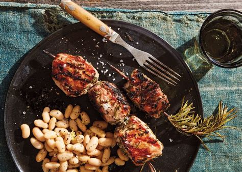 porchetta-style-pork-kebabs-with-white-beans image