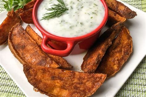 crispy-sweet-potato-wedges-with-herbed-yogurt-dip image