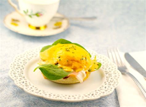 eggs-benedict-with-artichoke-roasted-red-pepper image