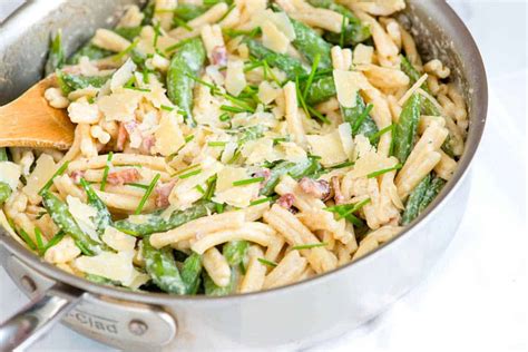 creamy-pasta-with-yogurt-bacon-and-snap-peas image
