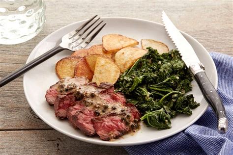 steak-green-peppercorn-sauce-with-kale-roasted-potato image