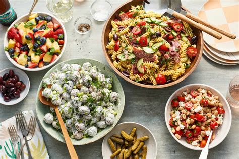 easy-potluck-salads-pasta-potato-fruit-the-kitchn image